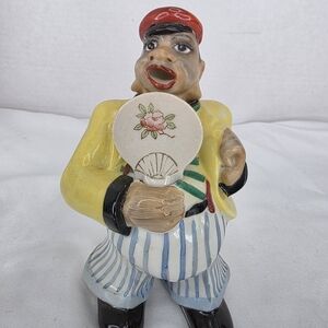Colorful Ceramic Figurine with Fan